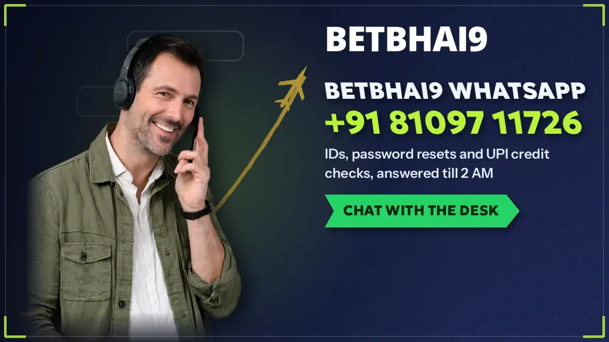 Support agent holding a phone with the Betbhai9 WhatsApp chat open for a new ID request